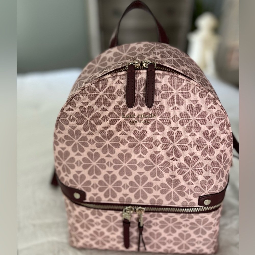 Kate Spade nylon clover spade print backpack. Pink and maroon.